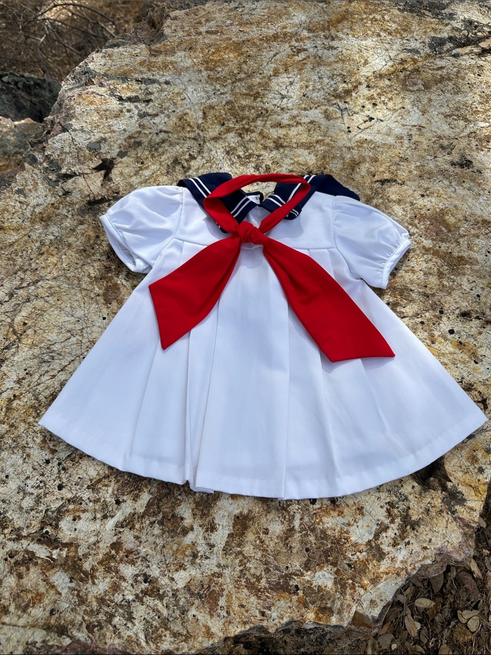 White Sailor-Style Dress with Red Bow